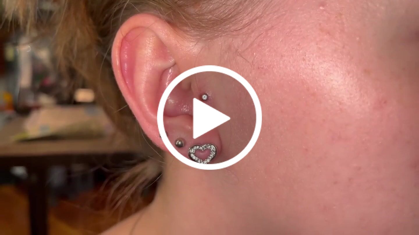 Customer video review of Dominique 18k White Gold Plated Silver Heart Stud Earrings with Swarovski Crystals