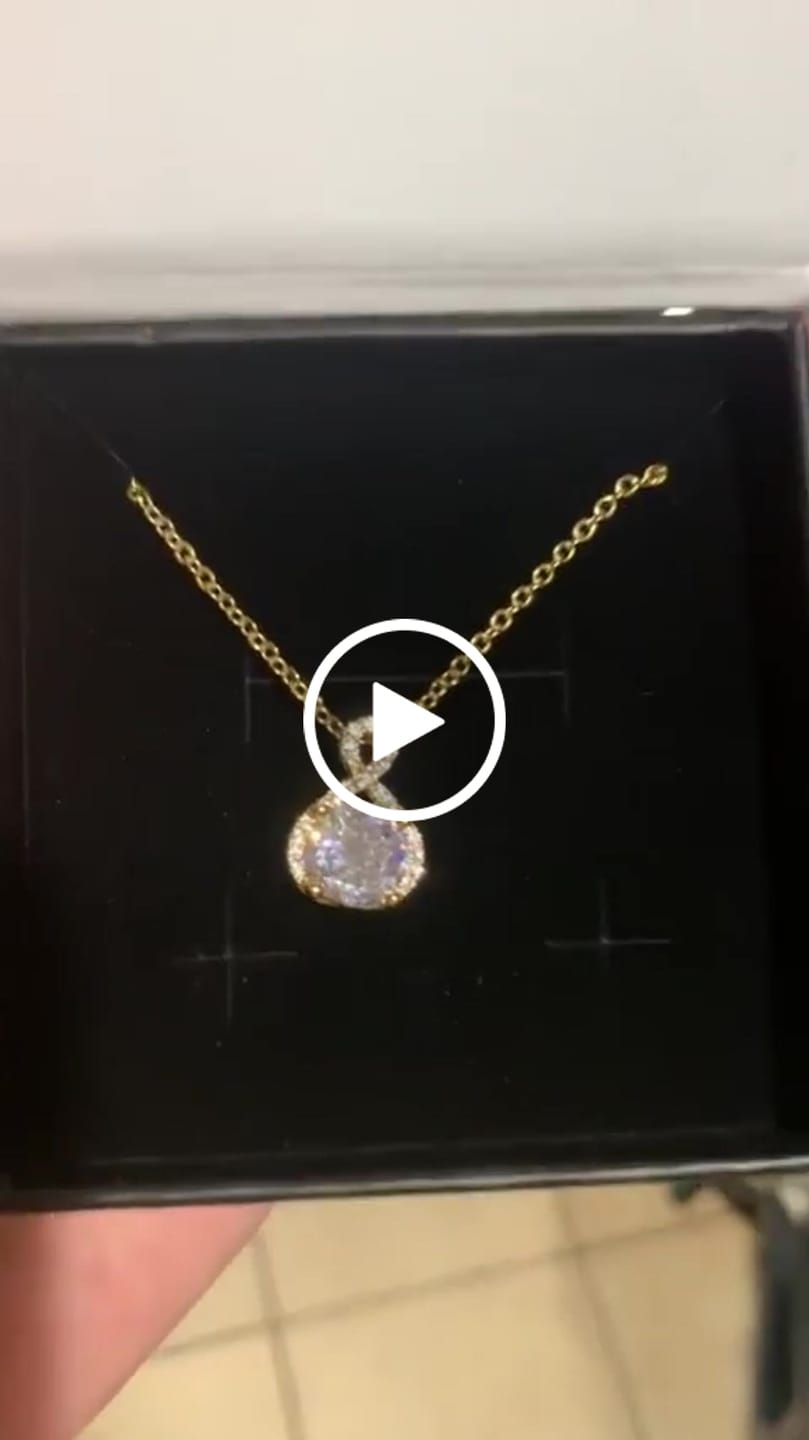 Customer video review of Alessandra 18k White Gold Plated Infinity Halo Pendant Necklace with Simulated Diamond Crystals