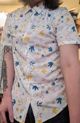 Customer photo review of Clearance Ready-to-Ship Dinosaur Footprint Tracks White Button Up Shirt