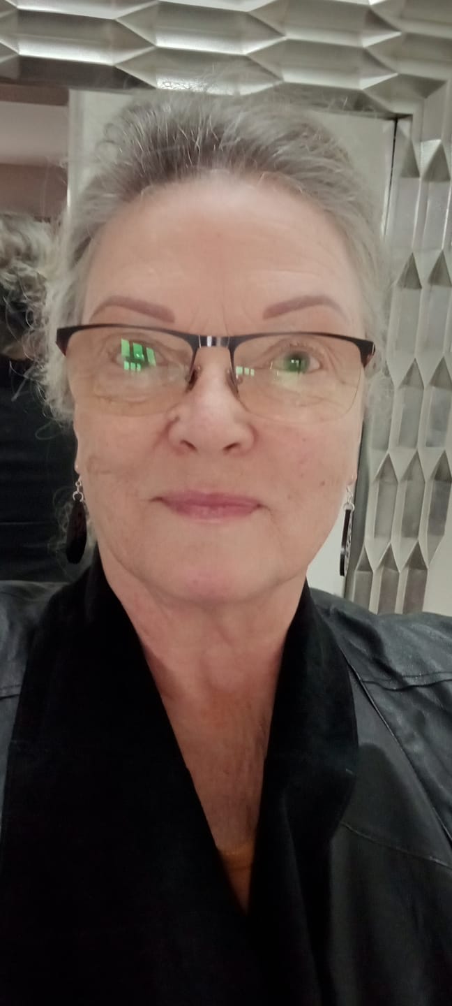 Customer photo review of Koru Swirl Earrings