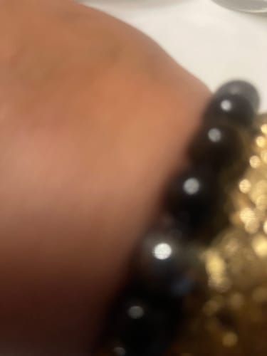 Customer photo review of Bracelet "Triple Protection" en Hématite, Oeil de Tigre et Obsidienne