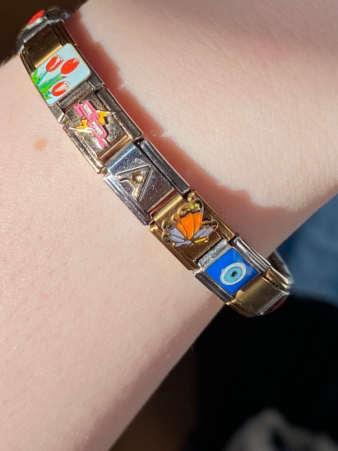 Customer photo review of Charm Mariposa Naranja Con Morado