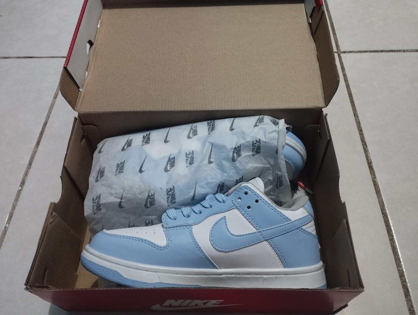 Customer photo review of Tenis Dunk Low Blanco Cielo