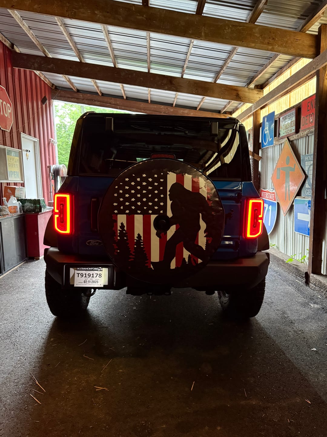 Customer photo review of Bigfoot or Sasquatch American Flag Spare Tire Cover for Bronco, Jeep, Camper, RV, & More