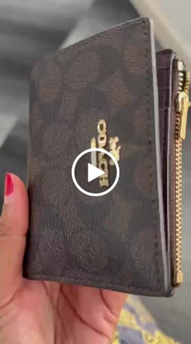 Customer video review of Coach Bifold Wallet Signature Canvas In Walnut Black Cw803