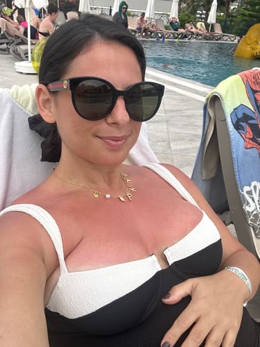 Customer photo review of 18K GOLD STARFISH EARRINGS