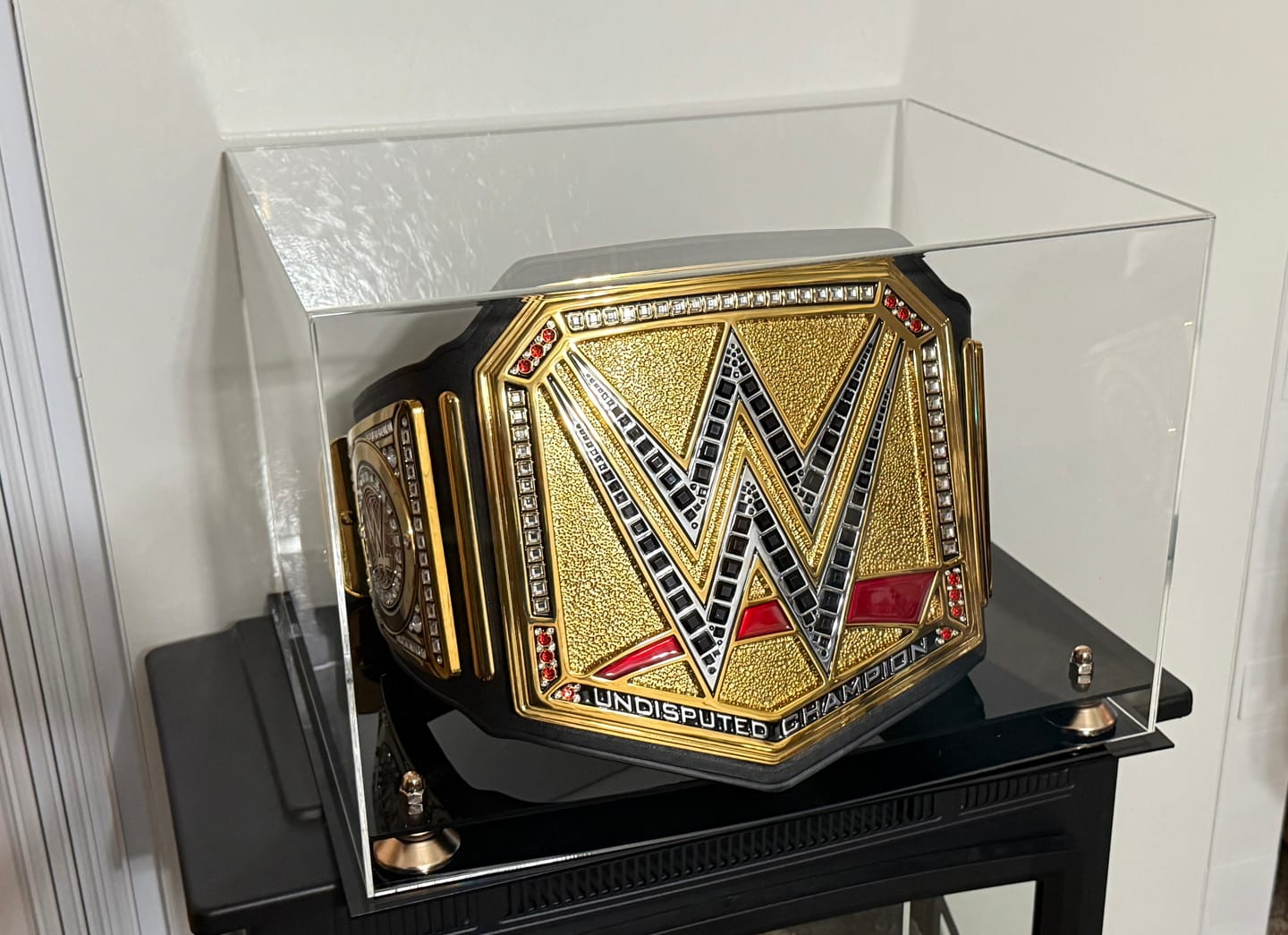 Customer photo review of Clear Acrylic Wrestling Belt Display Case (A014)