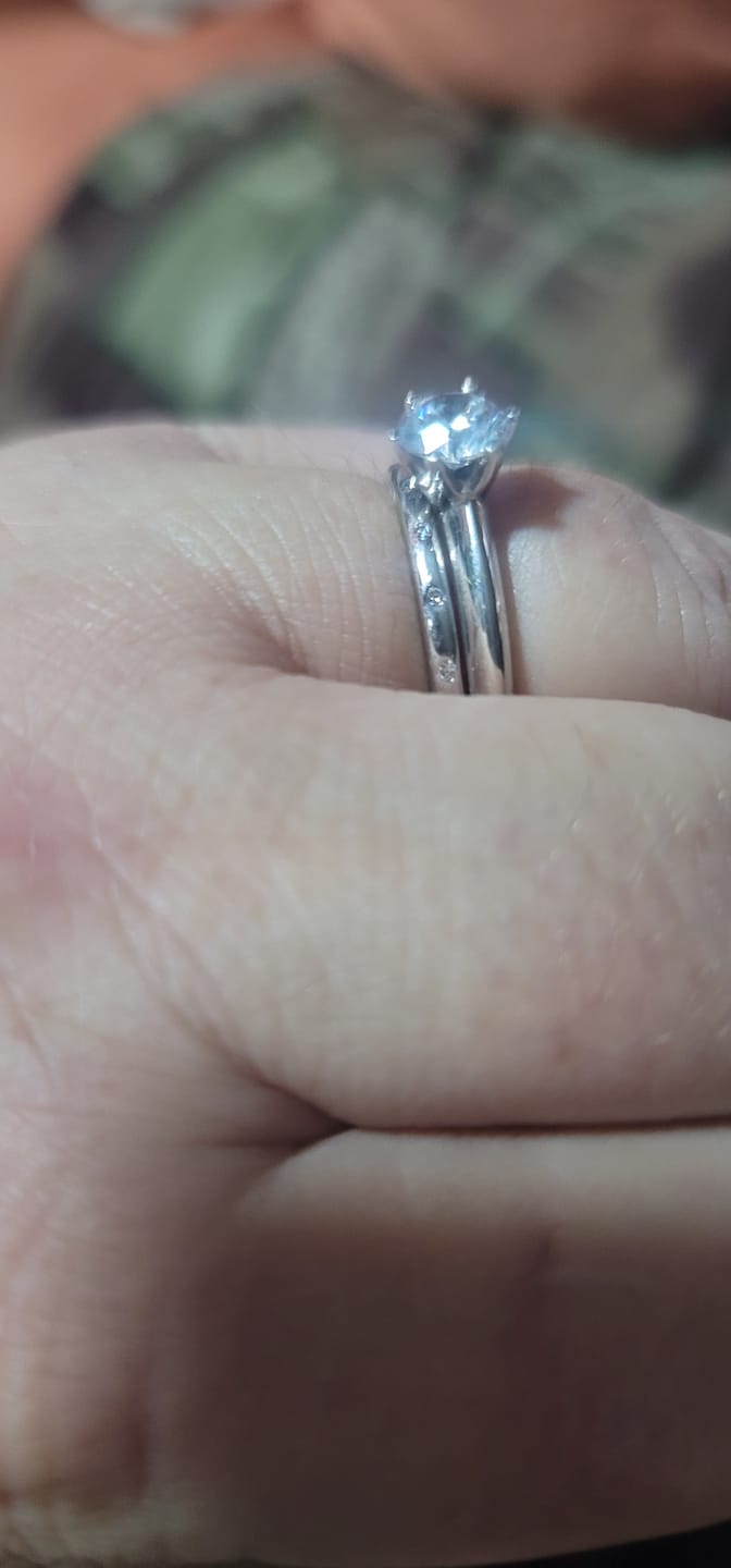Customer photo review of Flush Set Moissanite Evenly Spaced Eternity Wedding Band