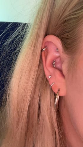 Customer photo review of DIXI Curved Threadless Cartilage Stud