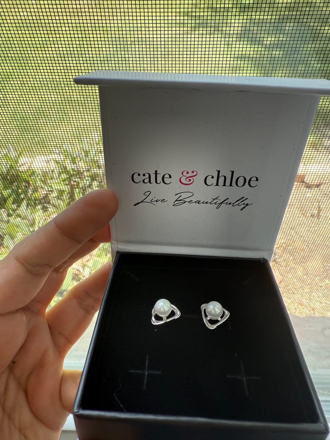 Customer photo review of Winnie 18k White Gold Plated Pearl Stud Earrings