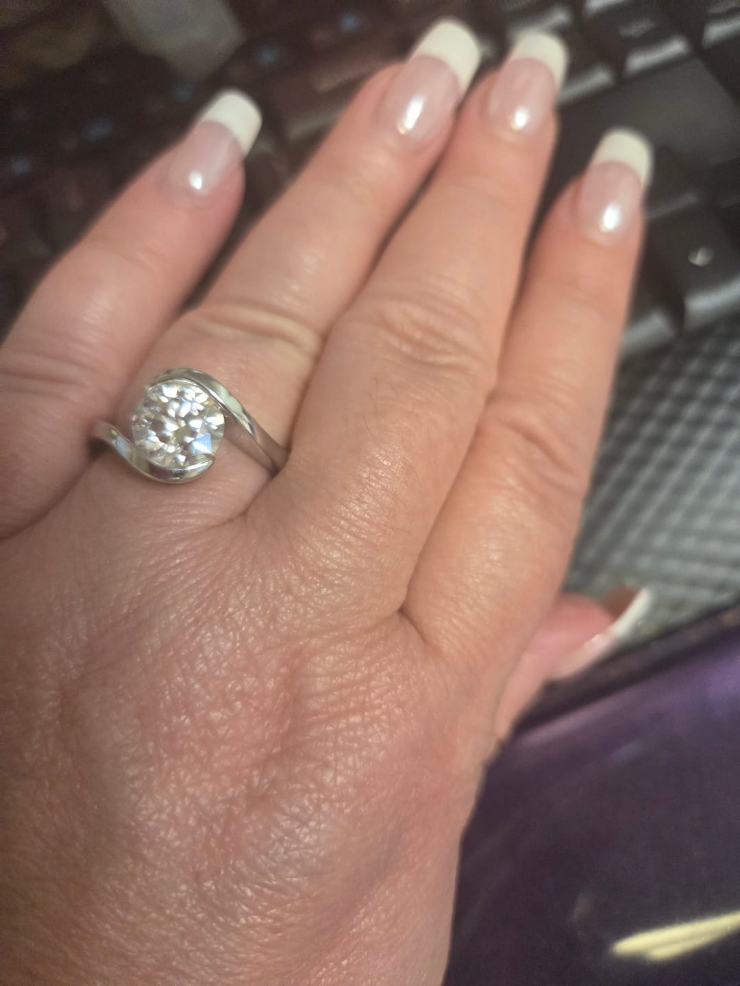 Customer photo review of Solitaire Tension Set Moissanite Bypass Engagement Ring