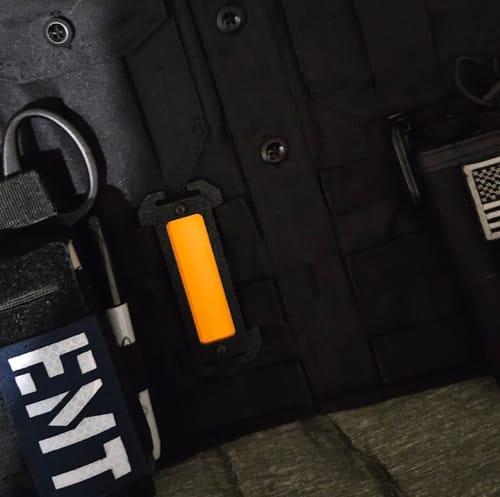 Customer photo review of Orange Glow In The Dark Web MOLLE Identifier