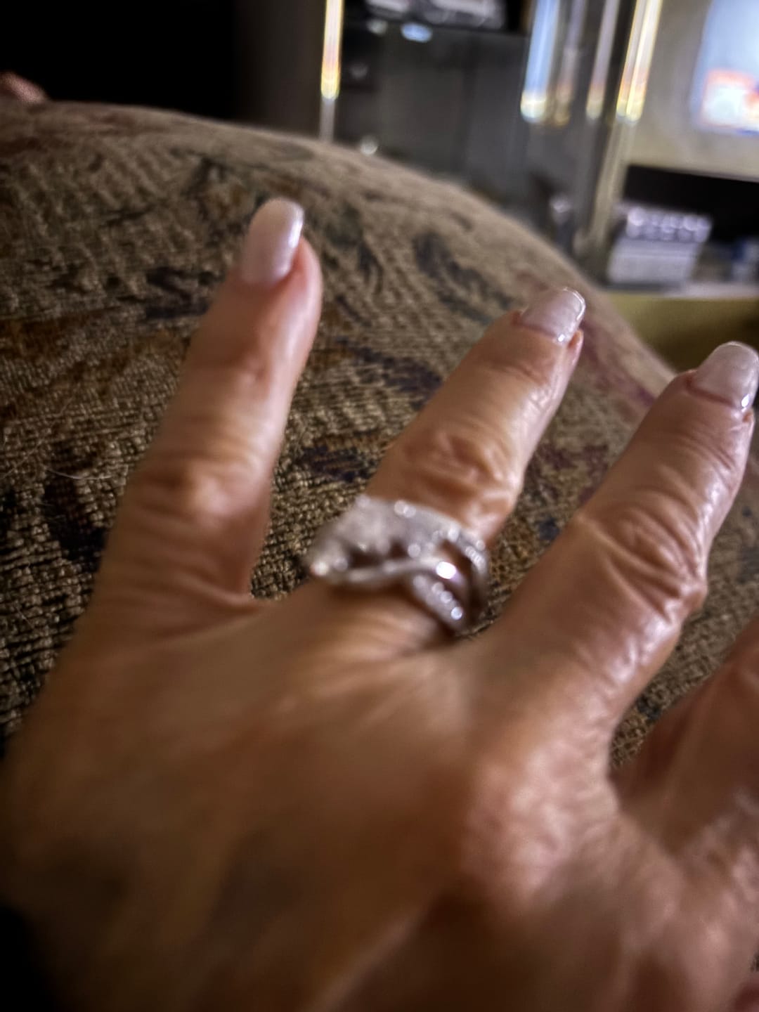 Customer photo review of Swirl Three Stone Moissanite Twisted Pave Engagement Ring