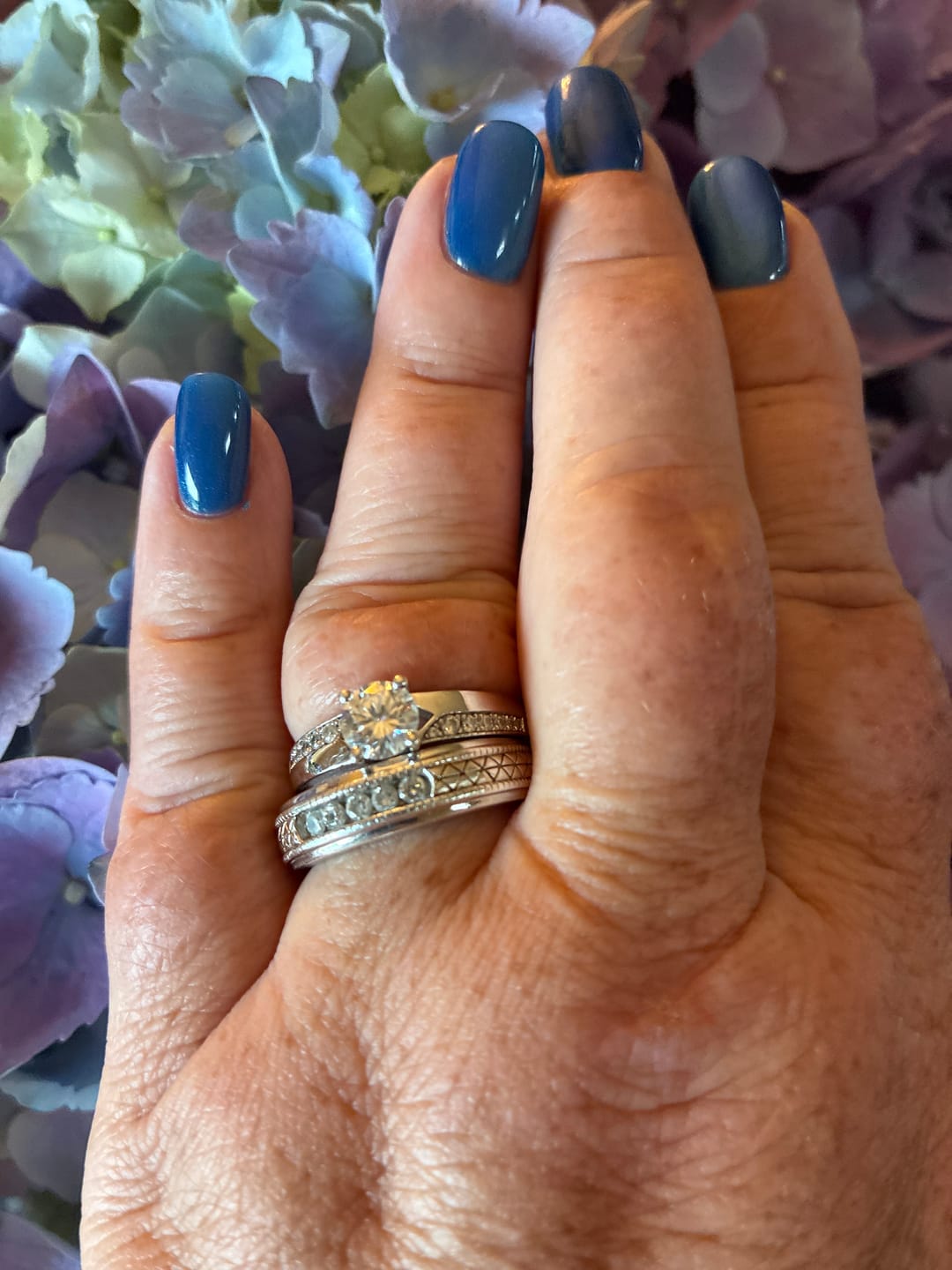Customer photo review of Round Moissanite Offset Side Stone Row Engagement Ring