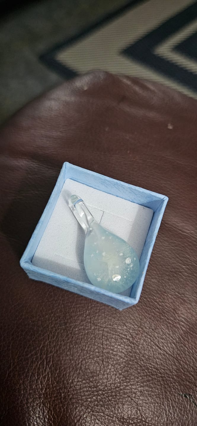 Customer photo review of Glow in the Dark Pendant with Infused Cremation Ashes