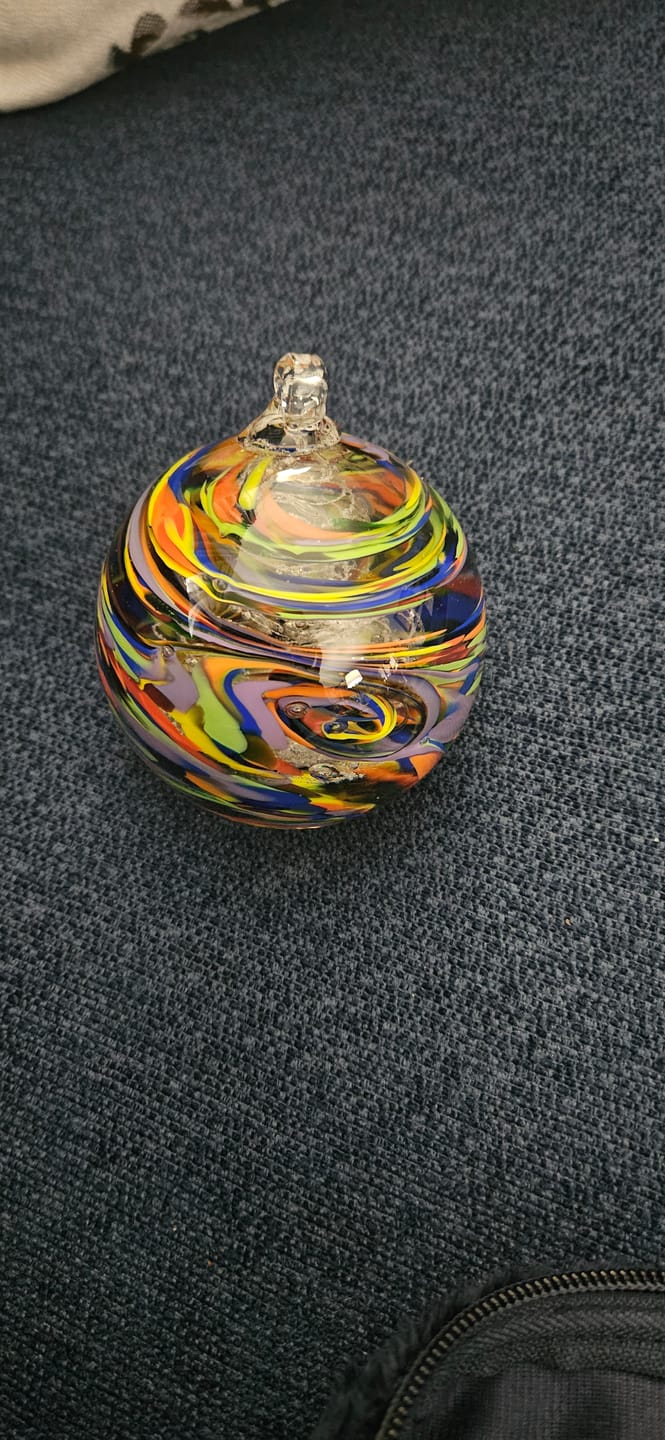 Customer photo review of Rainbow Confetti Orb with Cremation Ashes