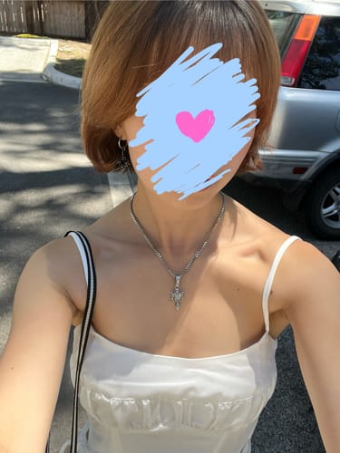 Customer photo review of TRIBAL CROSS PENDANT