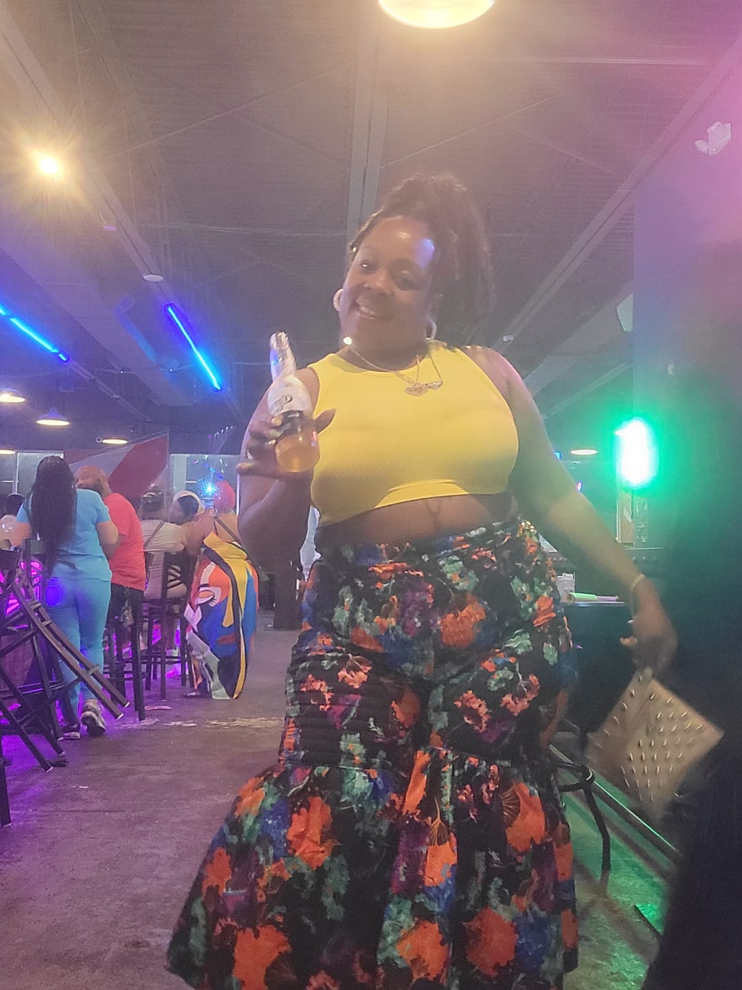 Customer photo review of Kimi Women's African Print Bell Bottom Pants- Blue