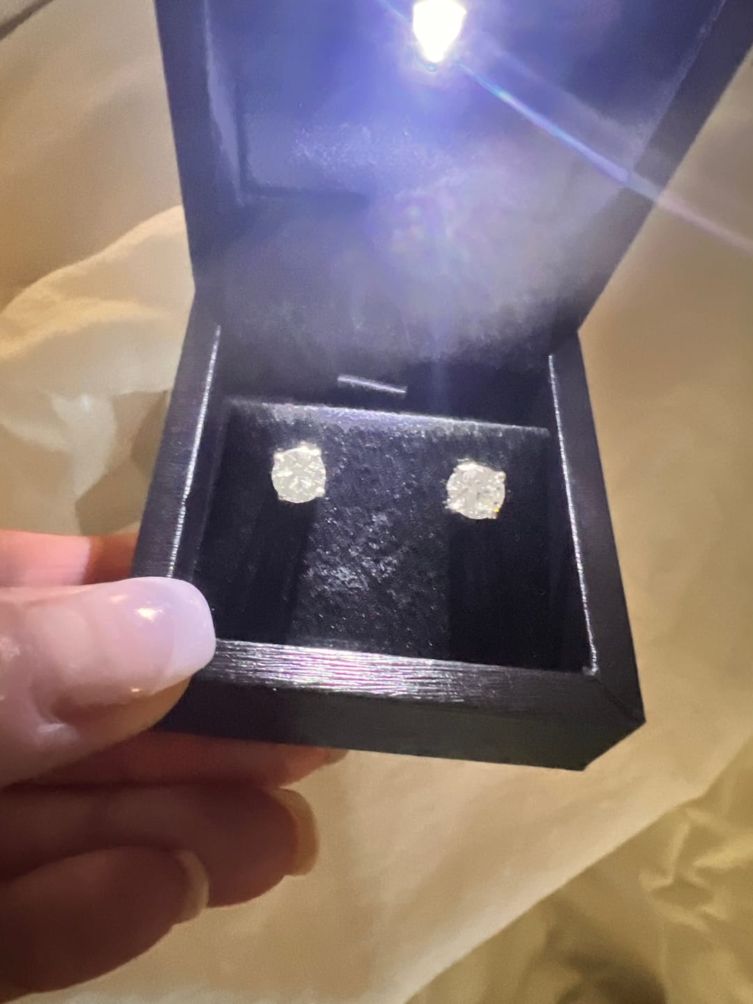 Customer photo review of 2.02 Carats G Si1 Platinum Martini Style Natural Earth Mined Diamond Studs