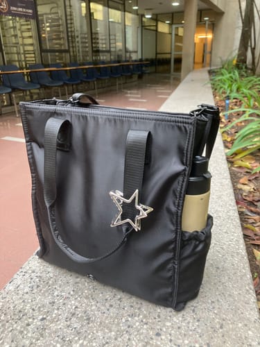 Reseña con foto de un cliente sobre Cartera De Hombro Para Notebook