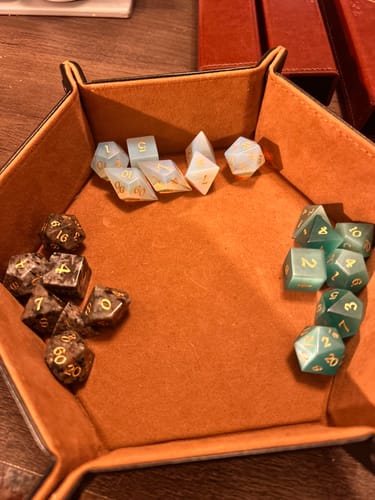 Customer photo review of Gemstone Aquamarine Cats Eye Stone Hand Carved DND Dice Set