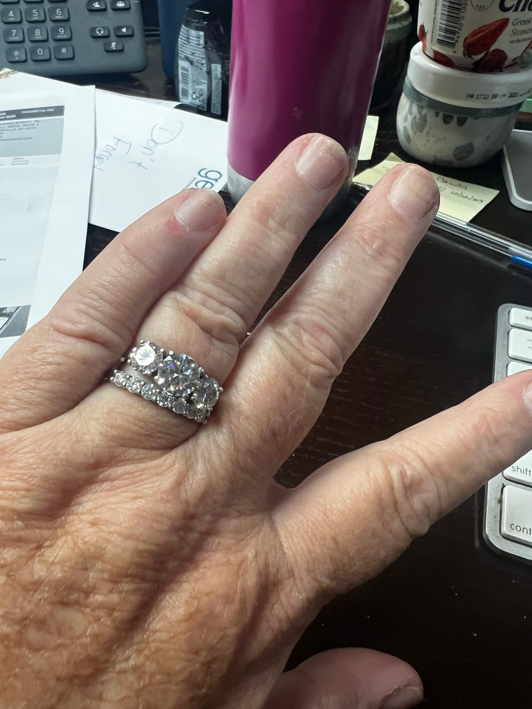 Customer photo review of Round Moissanite Sterling Silver Wedding Band Stackable Ring
