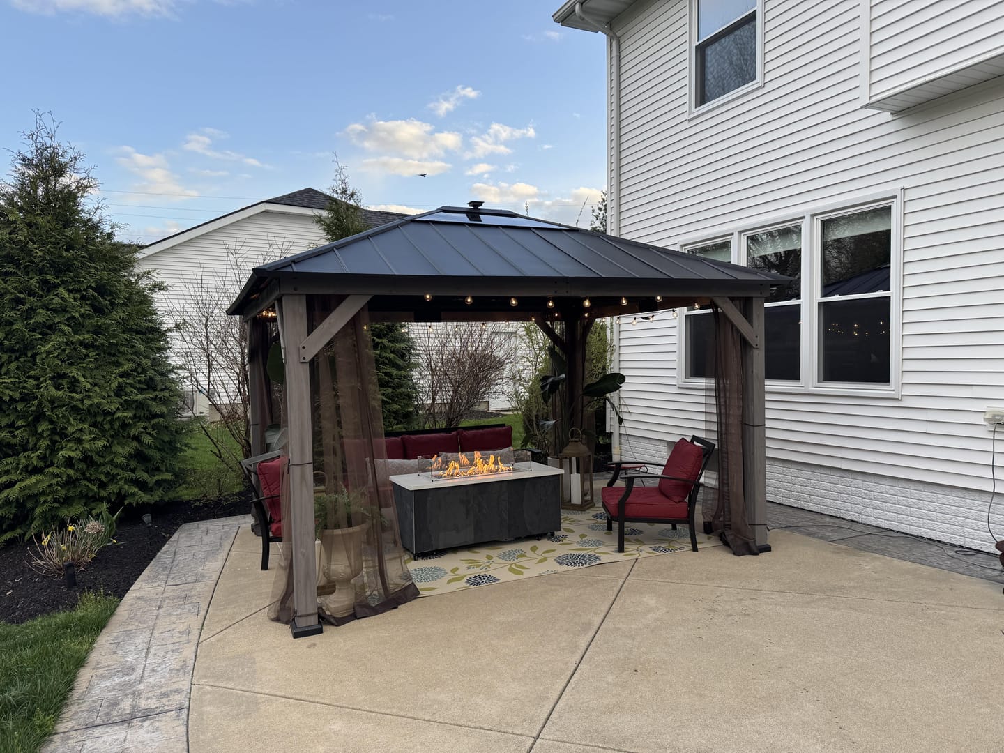 Customer photo review of SUNJOY 11x13 Wooden Gazebo with Solar Panel, LED Lights and Ceiling Hook - Weathered Cedar
