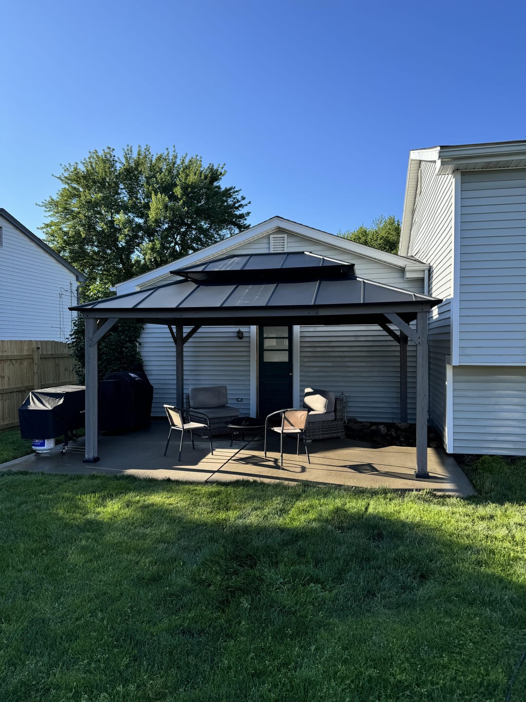 Customer photo review of SUNJOY 10x12 Outdoor Cedar Framed Wooden Gazebo with 2-tier Metal Roof and Ceiling Hook - Driftwood Cedar
