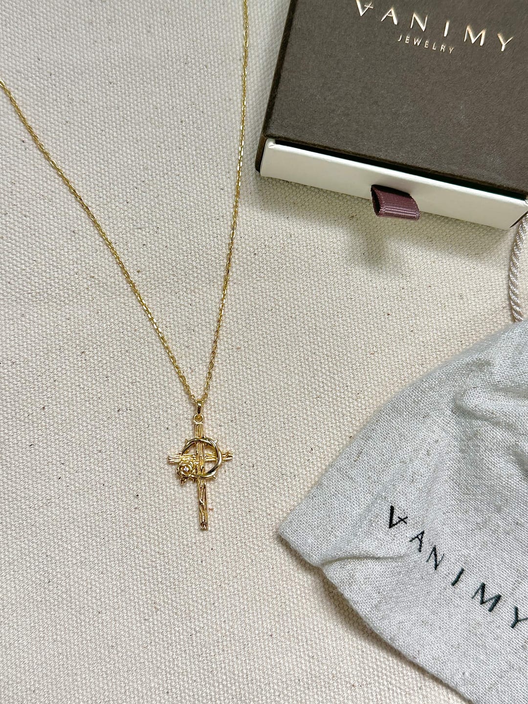 Customer photo review of Crown of Thorns Lily Cross Pendant Necklace