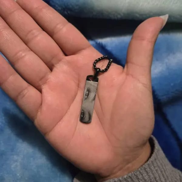 Customer photo review of Custom Engraved Eyes Necklace