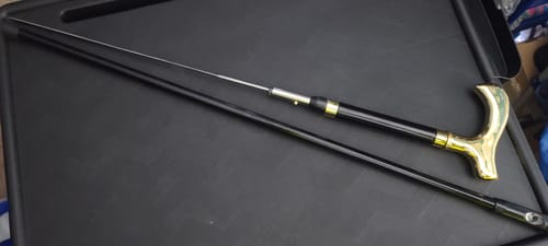 Customer photo review of Black and Gold Gent Sword Cane