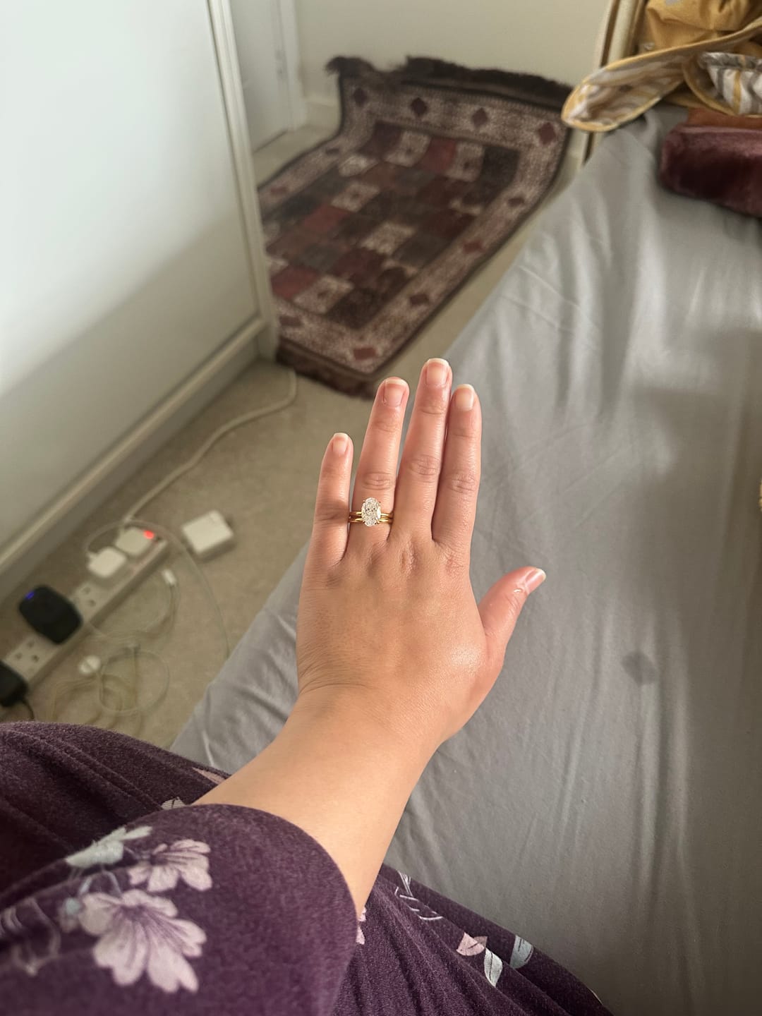 Customer photo review of Gold Plain Band Oval Solitaire Ring