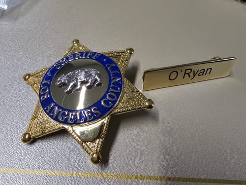 Customer photo review of Customizable Name Tag Bar Solid Copper Nameplate Highest Police Quality GOLD