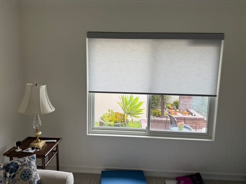 Customer photo review of SmartWings Motorized Light Filtering Roller Shades 70% Blackout Essential
