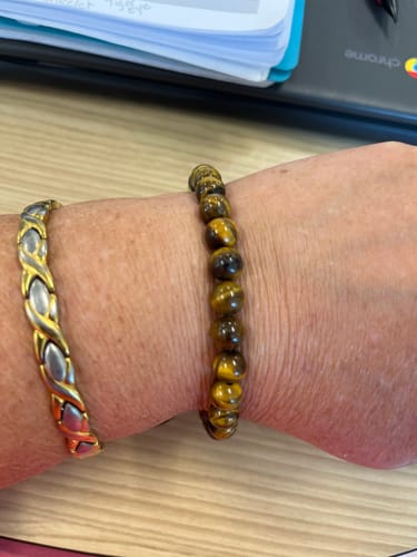 Customer photo review of Tiger's Eye Battle Beaded Bracelet: Helps Pair Veterans With A Service Dog Or Shelter Dog