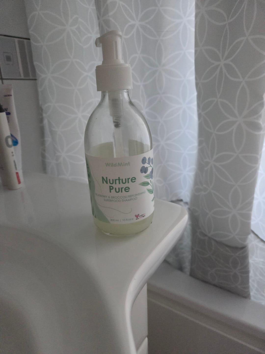 Customer photo review of Nurture Pure Shampoo