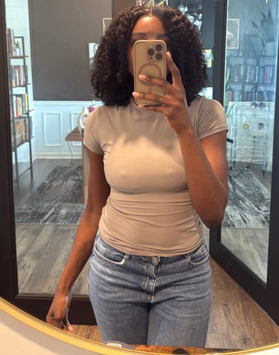 Customer photo review of CurlyMe Pre-bleached Wear Go Glueless Afro Kinky Curly Pre-cut HD Lace Wig Pre-plucked