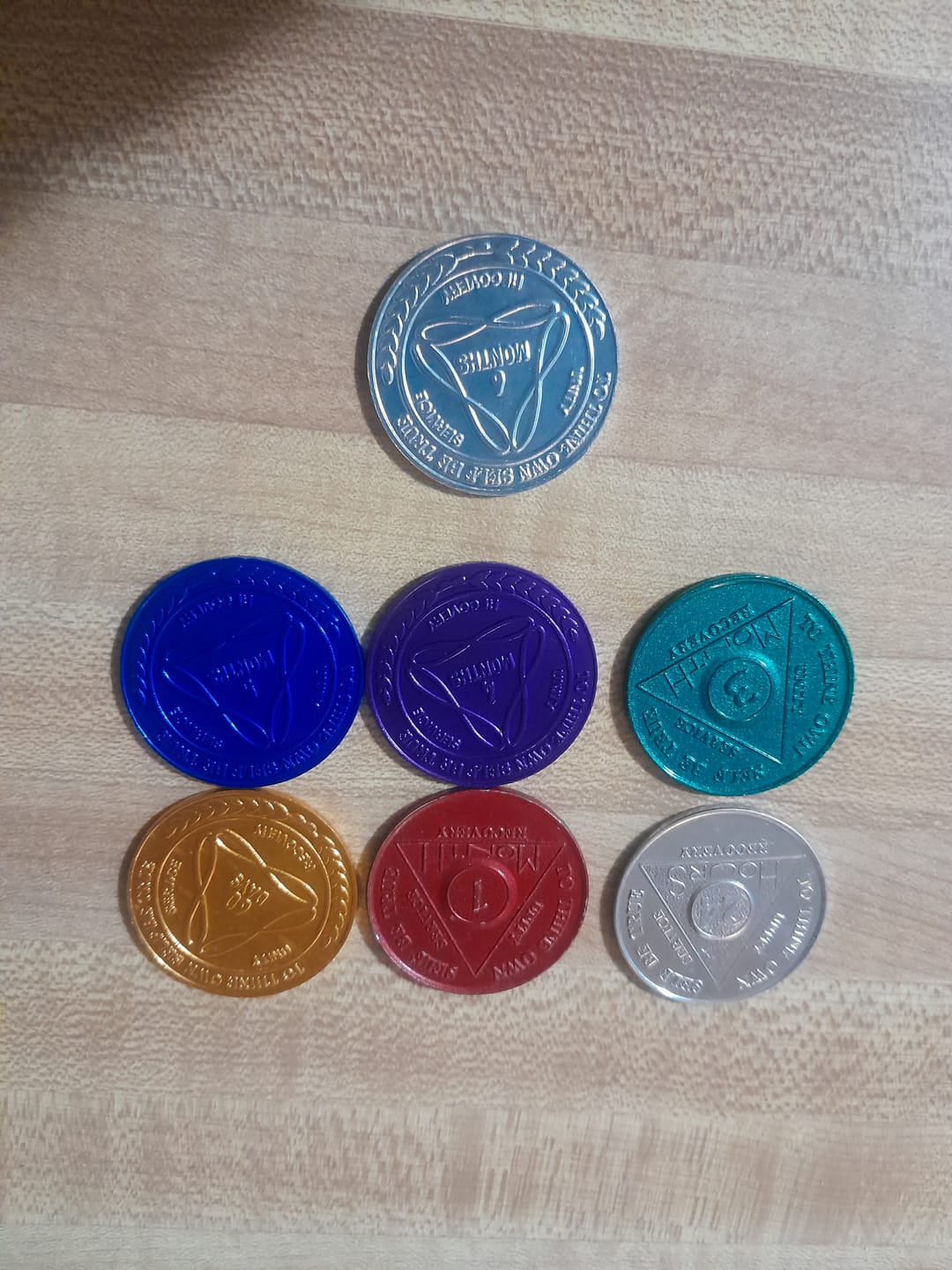 Customer photo review of Sobriety Mint Infinity Aluminum AA Meeting Newcomer Sobriety Chips/Coins/Tokens - 6 Months - Silver
