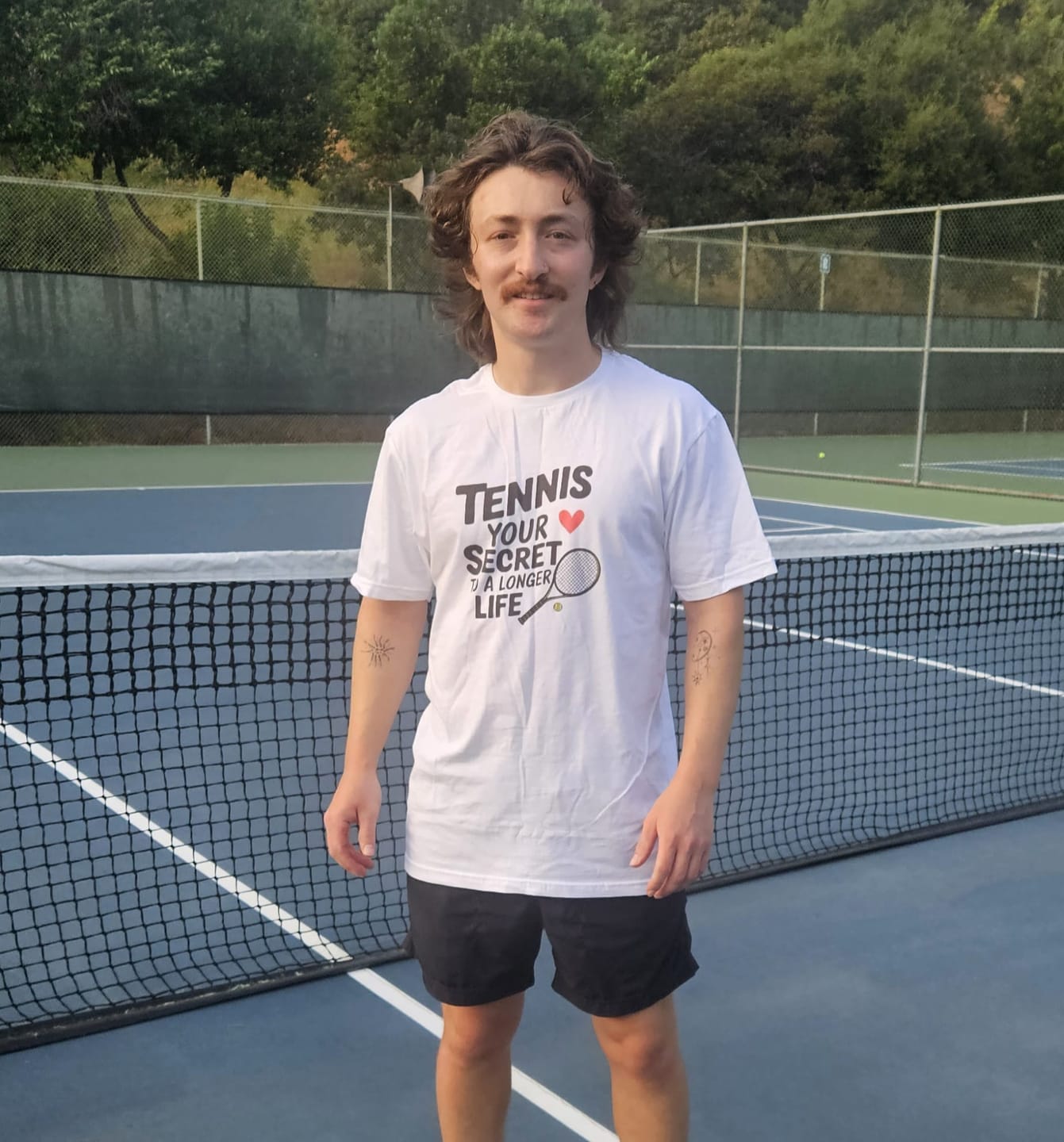 Customer photo review of Secret To A Longer Life T-Shirt