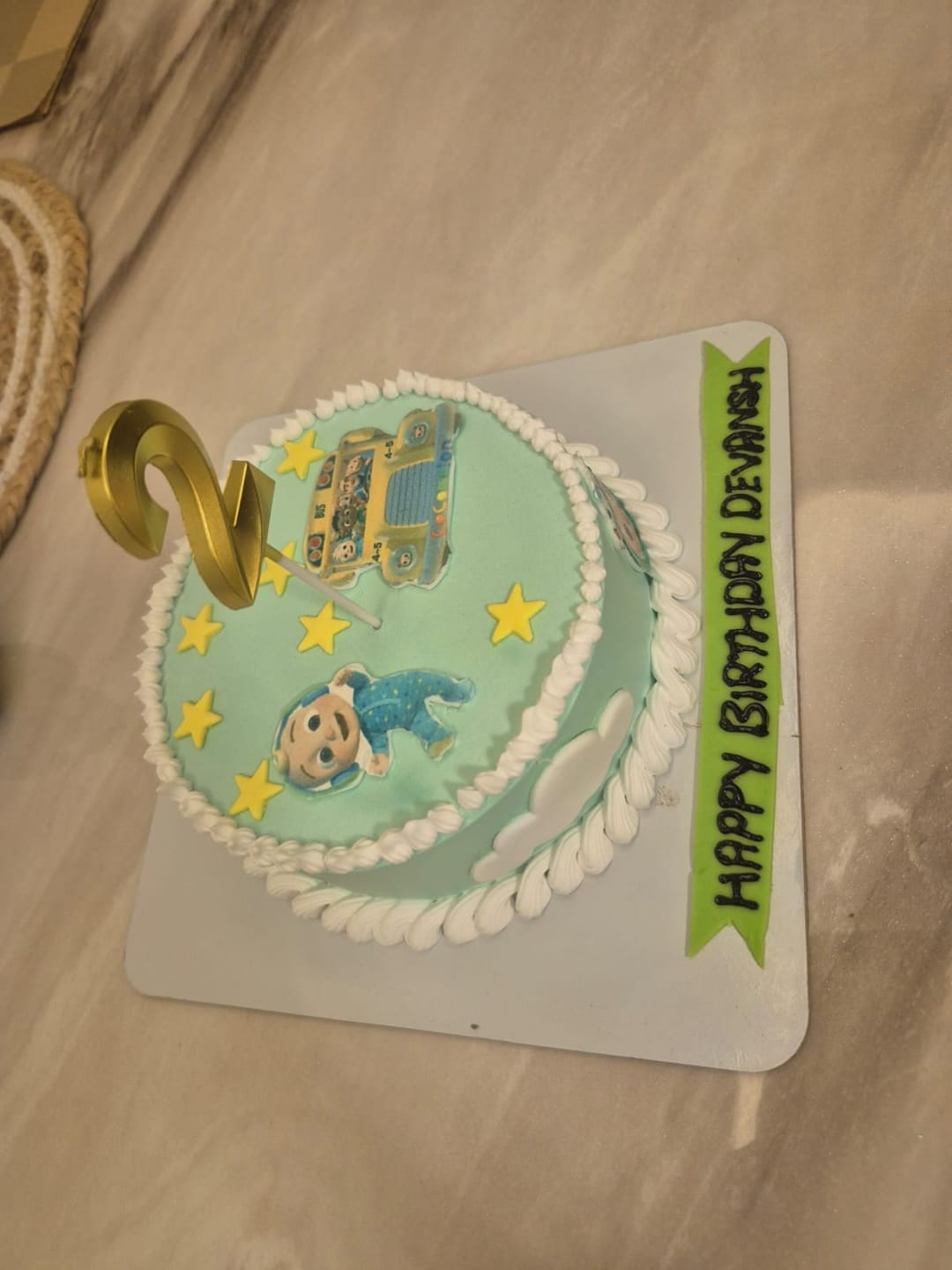 Customer photo review of Cocomelon photo cake