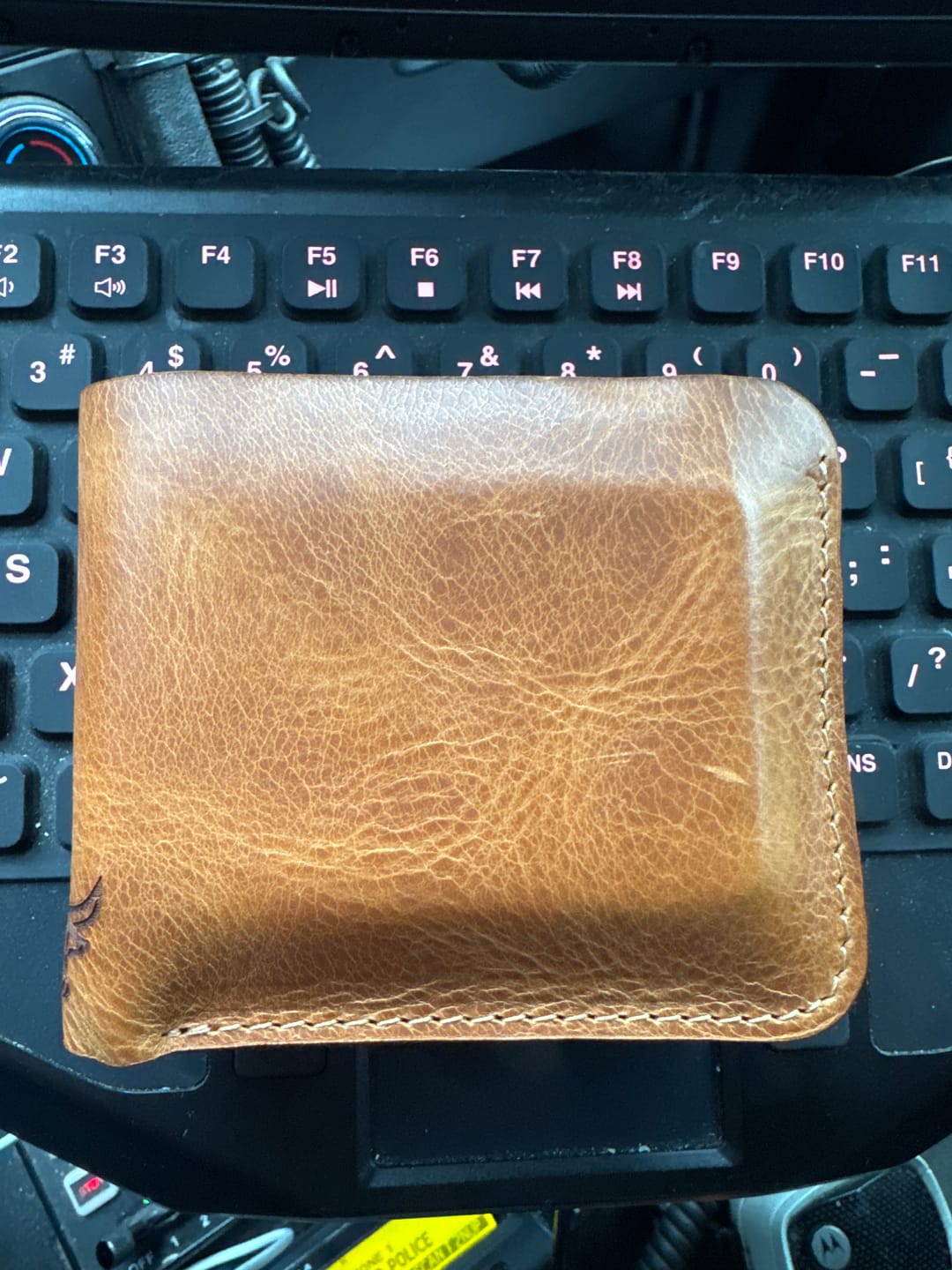 Customer photo review of Badge Bifold Wallet