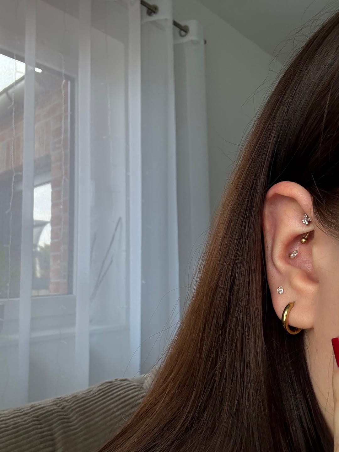 Customer photo review of Single Stone Piercing | Titan