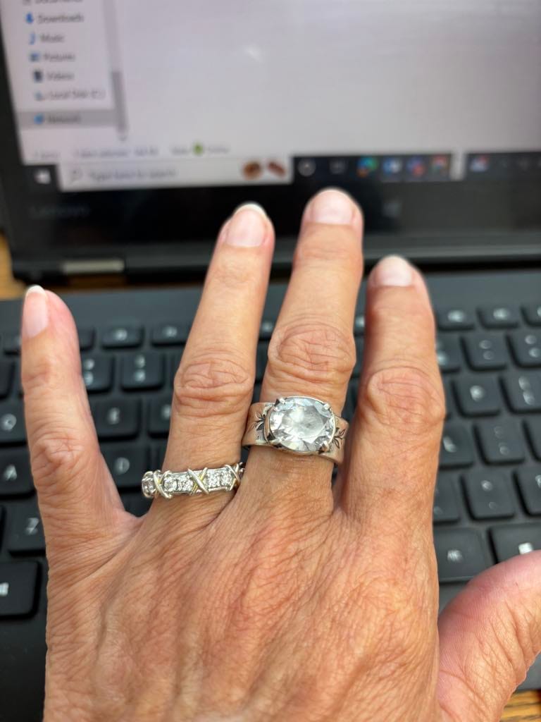 Customer photo review of Alternating Round Moissanite And Golden Xs Eternity Wedding Band Ring