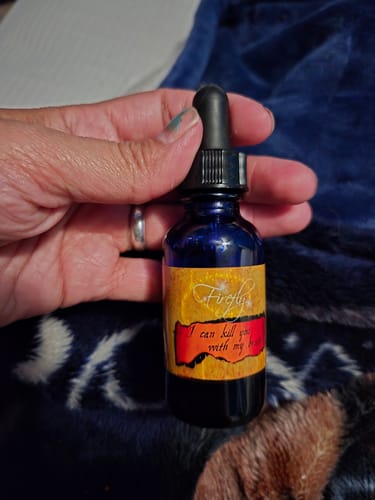 Customer photo review of I Can Kill You With My Brain 1oz Hair and Body Oil