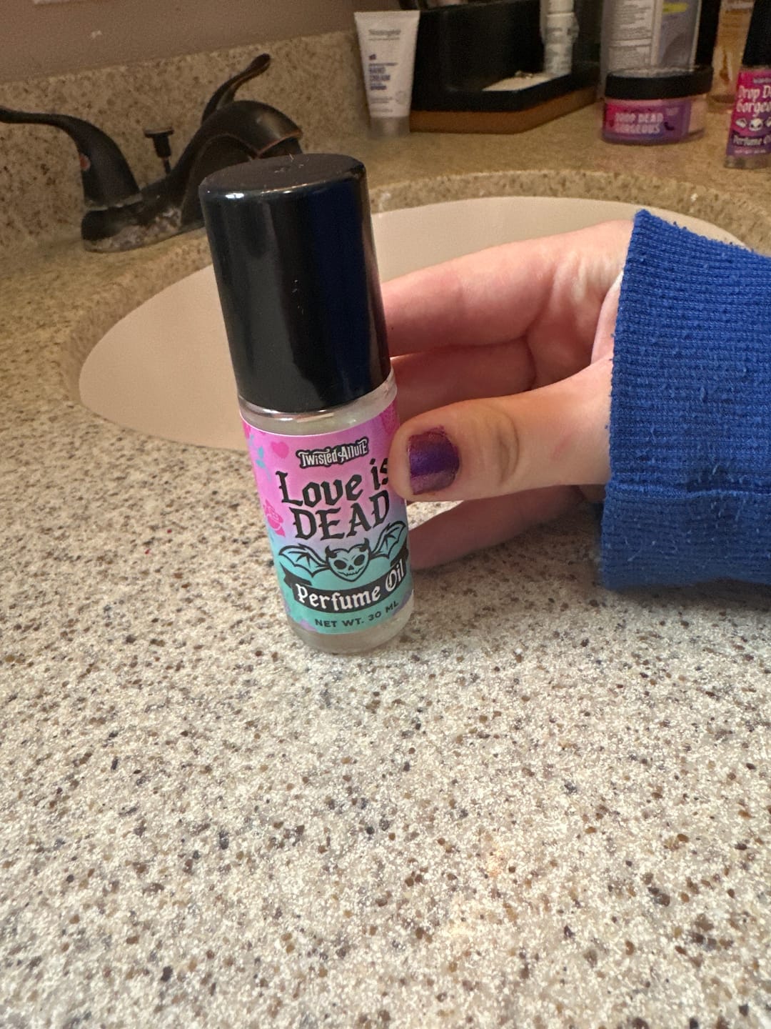 Customer photo review of Love Is Dead Perfume Oil