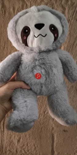 Customer photo review of Sloth Breathing Musical Plush Toy