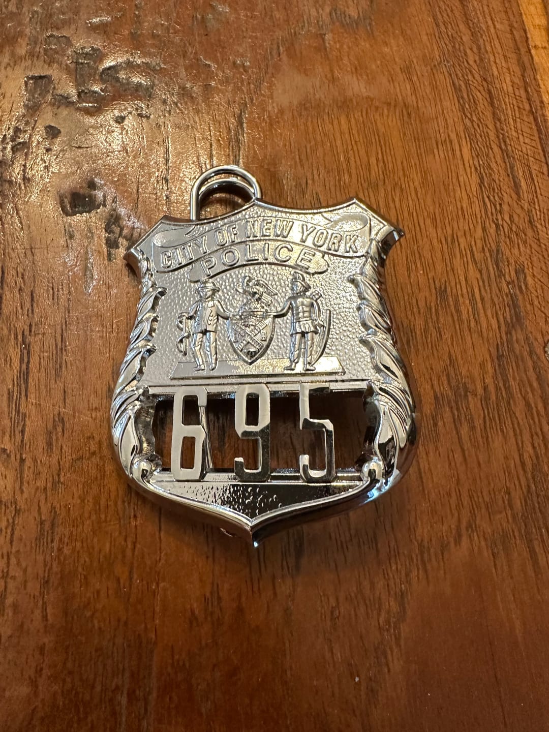 Customer photo review of NY New York Police Officer Badge Replica Movie Props *Customizable Badge Number*
