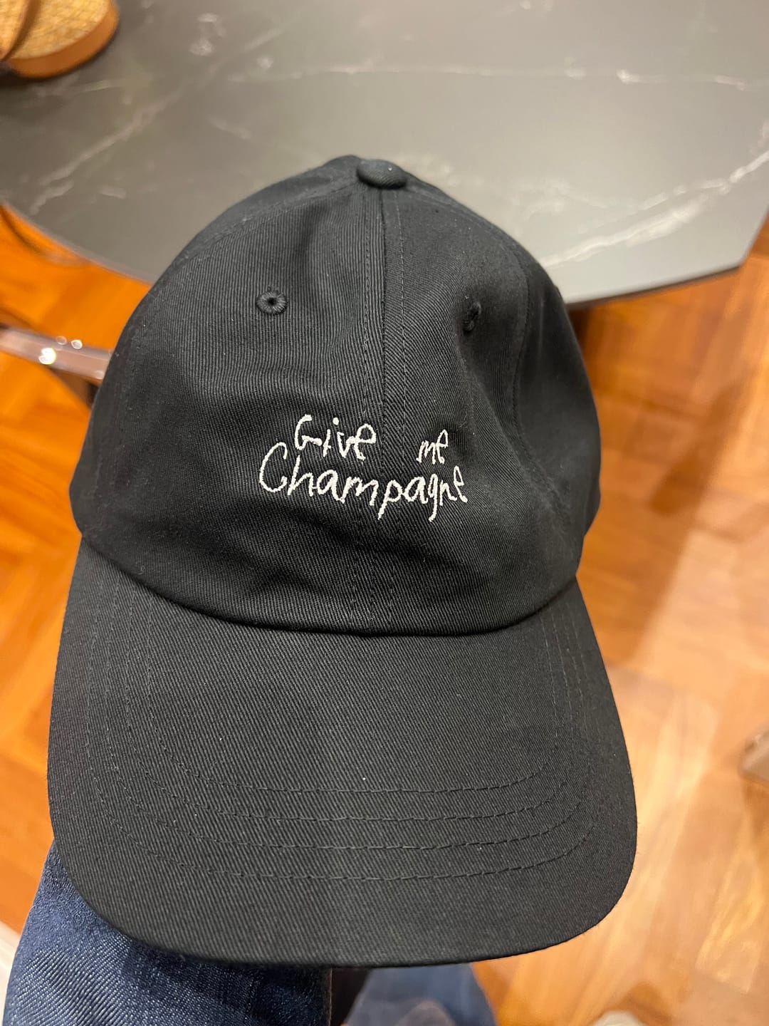 Customer photo review of The Give Me Champagne Dad hat