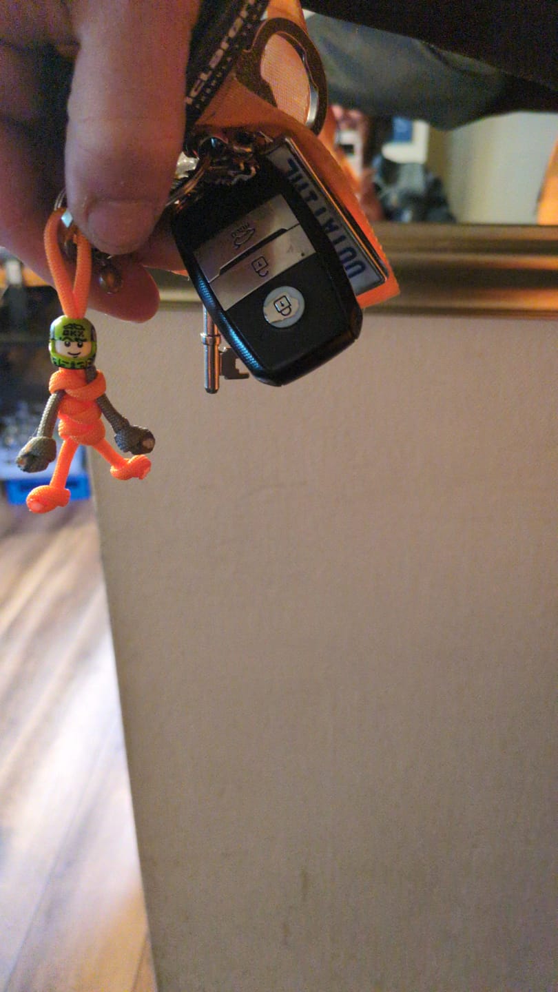 Customer photo review of Limited Edition 2025 Lando Norris Racing Paracord Buddy Keychain