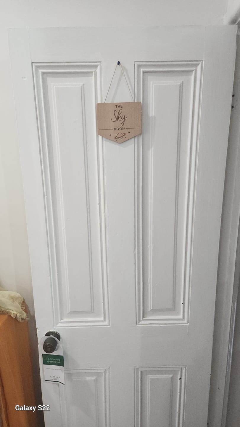 Customer photo review of Personalised Hanging Door Sign